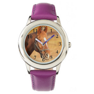 Hermoso reloj de caballos