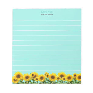 Hermosos girasoles en cuaderno rayado de cielo azu