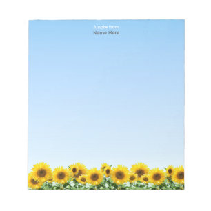 Hermosos girasoles en cuaderno simple de color azu