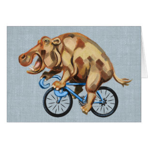 Hippo montando una bicicleta