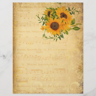 Hoja de música antigua y papel de cuadernillo de g