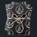 Hoja De Papel De Regalo Black Christmas Tree Vintage<br><div class="desc">Envuelve tus regalos con una elegancia festiva morosa con este inolvidable conjunto de sábanas de papel de envoltura negra, con un impresionante patrón repetido de árboles de Navidad enmarcado en fronteras ornamentales de inspiración vintage. Diseñado para dar un giro gótico y audaz a la entrega de regalos de los Navidades...</div>