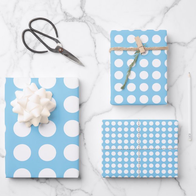 Hoja De Papel De Regalo Blanco sobre el azul del bebé de diferentes tamaño (Anverso)
