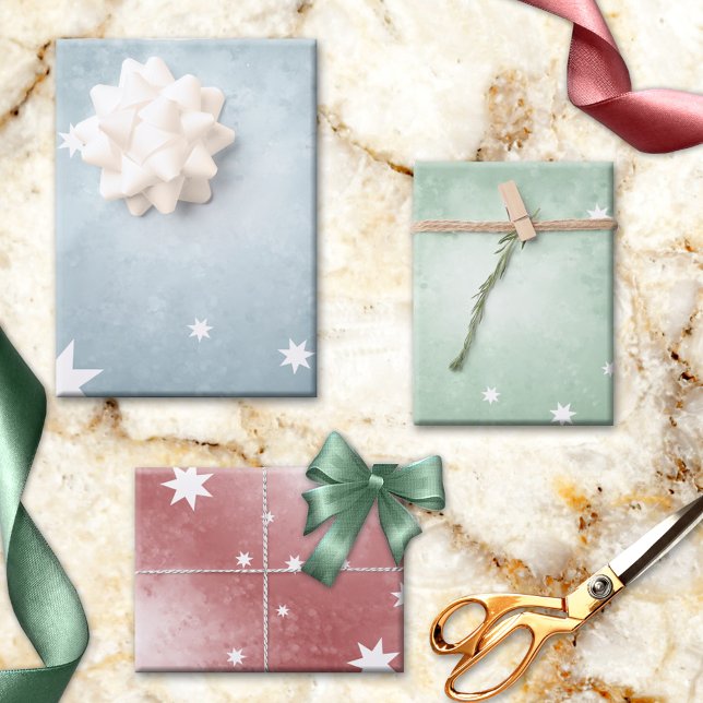 Hoja De Papel De Regalo Elegante Pastel Resumen Navidades del Patrón Estel (Lovely pastel fantasy star pattern Christmas wrapping paper sheets in blue, red and green.)