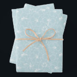Hoja De Papel De Regalo Floral blanca sobre azul<br><div class="desc">Tres hojas de papel envuelto presentan un contorno de flores de hibisco blanco tropical sobre un fondo azul pálido (o cualquier color que elija). Hermoso envoltorio de regalo para cumpleaños,  boda,  aniversario o cualquier ocasión. MÁS colores en nuestra tienda.</div>