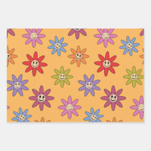 Hoja De Papel De Regalo Flores coloridas felices sonriendo sobre naranja