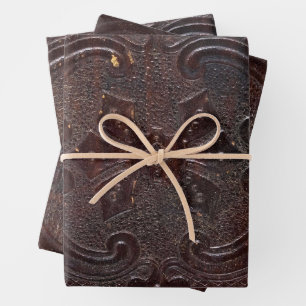 Hoja De Papel De Regalo Libro de cuero antiguo caído