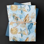 Hoja De Papel De Regalo Moda costera | Azul y oro modernos bajo el mar<br><div class="desc">El diseño de la playa, pintado a mano con una magnífica acuarela azul polvorienta y dorada, da un toque moderno a una temática antigua. La colección cuenta con conchas de concha, pez estrella, un caballito de mar y arrecife de coral que complementan los tonos azules, dorados y blanquecinos con un...</div>