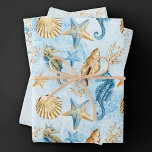 Hoja De Papel De Regalo Moda costera | Azul y oro modernos bajo el mar<br><div class="desc">El diseño de la playa, pintado a mano con una magnífica acuarela azul polvorienta y dorada, da un toque moderno a una temática antigua. La colección cuenta con conchas de concha, pez estrella, un caballito de mar y arrecife de coral que complementan los tonos azules, dorados y blanquecinos con un...</div>