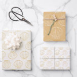 Hoja De Papel De Regalo Moda náutica de la playa de la costa<br><div class="desc">Añada un toque de elegancia a sus regalos con este papel de envoltura de moda costera náutica. Con elegantes diseños de conchas doradas, es perfecto para los amantes de la playa y las celebraciones con temática oceánica. Ideal para bodas, cumpleaños o eventos de inspiración costera, estas sábanas de papel envolvente...</div>