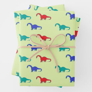 Hoja De Papel De Regalo Patrón de dinosaurios coloridos sobre verde