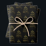 Hoja De Papel De Regalo Resumen Sparkling Gold, Black Christmas Tree<br><div class="desc">Este dibujo bonito y abstracto de un árbol de Navidad en Relieve metalizado brillante de oro simulado es una expresión elegante de las vacaciones en estas hermosas sábanas de papel envuelto. El diseño sencillo es una espiral brillante de oro en un fondo negro dramático, en forma de pino, con estrellas...</div>