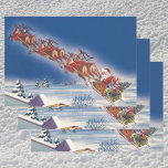 Hoja De Papel De Regalo Vintage Christmas, Santa Flying Sleigh w Reindeer<br><div class="desc">Ilustracion de la Vintage. Imagen de feriado navideño con un alegre Santa Claus con su reno. Están volando su trineo lleno de juguetes a través del cielo azul y sobre un pueblo dormido cubierto de nieve en invierno en la víspera de los Navidades. Ho, ho, ho Happy Holidays and Season's...</div>
