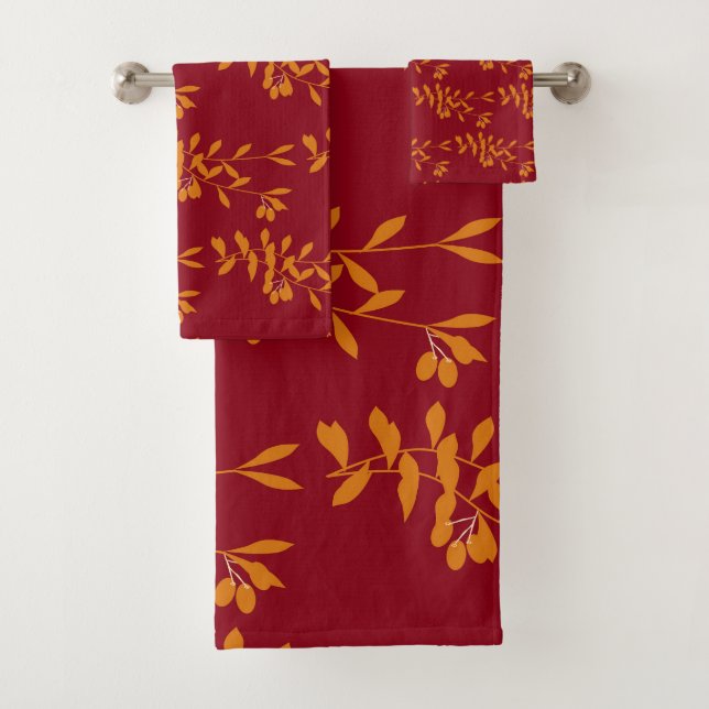 hojas de la rama de silueta naranja en rojo (In situ)