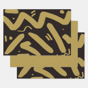 Hojas de papel de envolver negro y oro