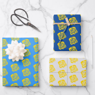Hojas de papel de envolvimiento de Dreidel dorado