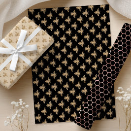 Hojas de papel de envolvimiento de oro y negro par