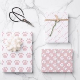 Hojas de papel de regalo con huellas de patas lind