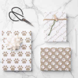 Hojas de papel de regalo con huellas de patas lind