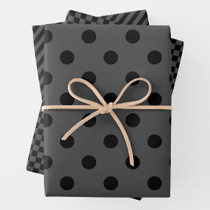 Hojas de papel de regalo grises y negros