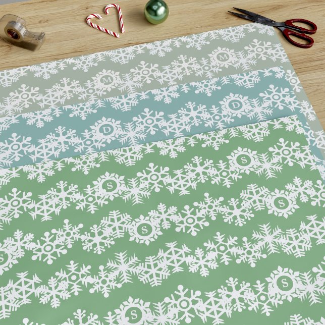 Hojas de Papel de Regalo Pastel con Monograma de C (A trio of Nordic pastel snowflake pattern wrapping paper sheets with space for your initials)