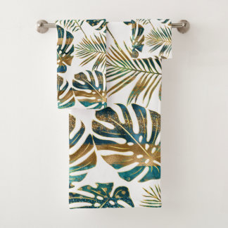 Hojas tropicales con estampado verde azulado y dor