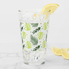 Hojas tropicales y puntos de polka sobre la textur