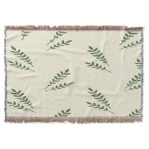 Hojas verdes y crema lanzan una manta