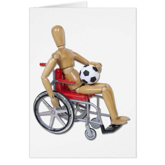 HoldingSoccerBallWheelchair (Frente)