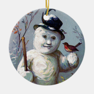 Hombre de nieve con ornamento vintage de pájaro y 
