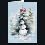 Hombre de nieve en el bosque con alegría roja<br><div class="desc">Una hermosa imagen de un muñeco de nieve en el bosque con un alegre JOY rojo llegando hasta ti. Todo sobre un fondo de color azul. VACACIONES FELICES en rojo y mejores deseos para el Año Nuevo en negro</div>