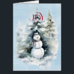 Hombre de nieve en el bosque con alegría roja<br><div class="desc">Una hermosa imagen de un muñeco de nieve en el bosque con un alegre JOY rojo llegando hasta ti. Todo sobre un fondo de color azul. VACACIONES FELICES en rojo y mejores deseos para el Año Nuevo en negro</div>