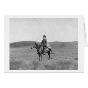Hombre en caballo con una foto de un Antelope muer