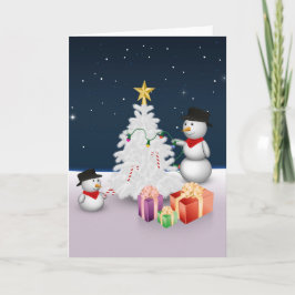 Hombres de nieve con árbol de Navidad