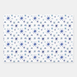 Hoyo azul y hojas de papel de envolvimiento del ar