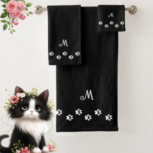 Huellas de mascota y monograma en negro