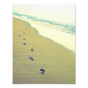 Huellas en la foto de la playa de la arena