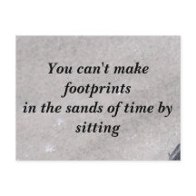 Huellas en la postal de arena