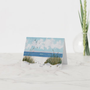 Huellas en la tarjeta de simpatía de arena