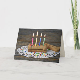 Huesos de perro de cumpleaños de la tarjeta de per