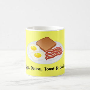 Huevos, tocino, tostada y café medios de la taza