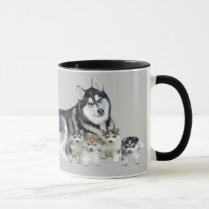 Husky siberiano y taza de los perritos
