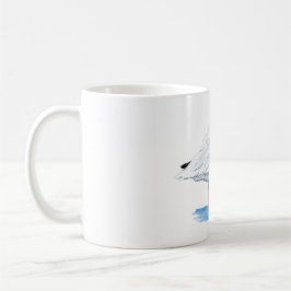 Ibis blanco sobre una taza de café