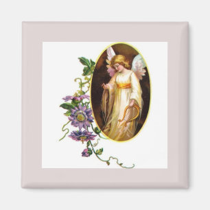 Imán Ángel con arpa y flores de clemátide