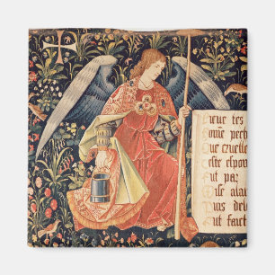 Imán Ángel con una esponja pegada a una varilla