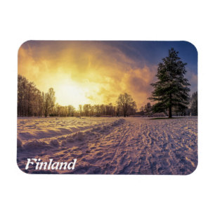 Imán Atardecer sobre el nevado parque invernal