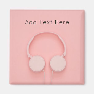 Imán Auriculares rosados con cables