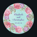 Imán Boda de Wreath de color de agua floral<br><div class="desc">Un boda bonito aguijón / conmemorativo o guardar el imán de fecha. Un bonito ilustracion de temática botánica con una corona circular de flores acuarelas de bonito en rosa y púrpura con hojas verdes en el medio. El diseño floral se compone de peonías rosadas y anémonas púrpura. El fondo es...</div>