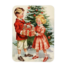 Imán Boy and girl giving each other Christmas presents