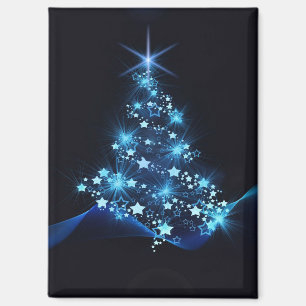 Imán Brillo azul de estrellas en árbol de Navidad oscur